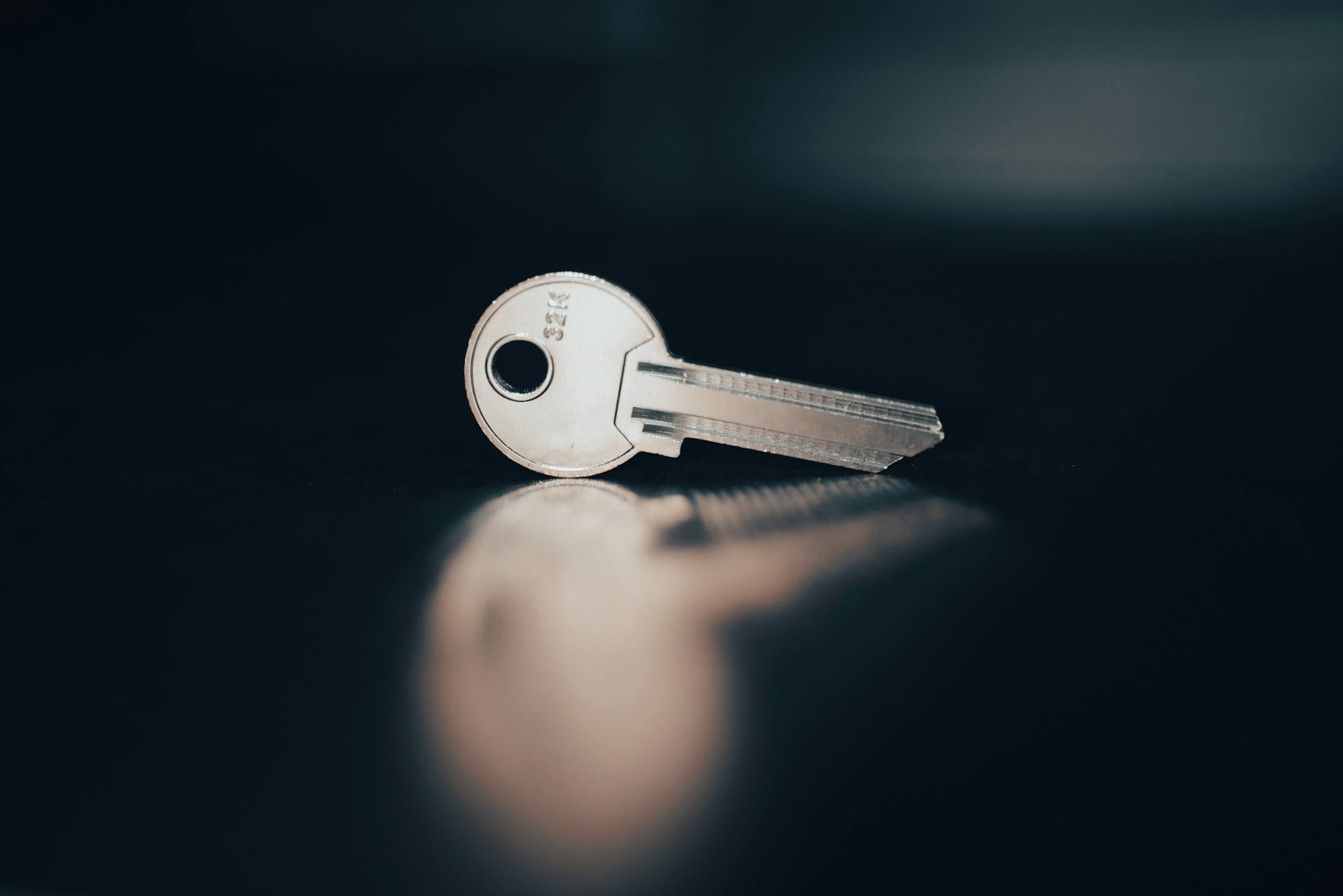 A freshly cut key on a table
